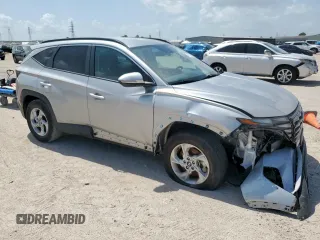 2023 Hyundai Tucson SEL with VIN 5NMJBCAE7PH220482, listed as a Copart auction lot 61783325 with 35,764 mi miles and Salvage title. Bid and sale history available at DreamBid. Image 4.