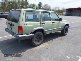 1998 Jeep Cherokee Sport with VIN 1J4FJ68SXWL264165, listed as a IAAI auction lot 42168443 with 244,828 mi miles and . Bid and sale history available at DreamBid. Image 4.