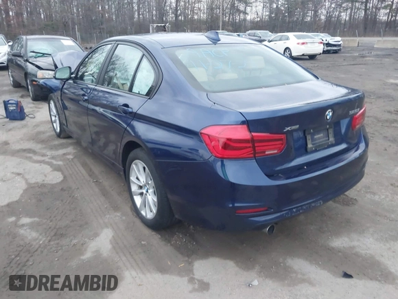 2018 BMW 3 Series 320i xDrive with VIN WBA8E5G58JNV02954, listed as a IAAI auction lot 41140422 with Not Provided miles. Bid and sale history available at carsss.com. Image 3.