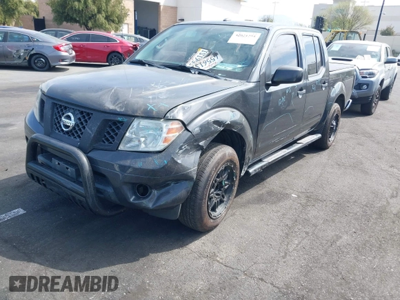 2014 Nissan Frontier SV with VIN 1N6AD0ER8EN756702, listed as a IAAI auction lot 42021294 with 135,143 mi miles and . Bid and sale history available at DreamBid. Image 2.