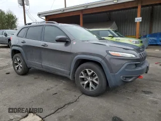 2016 Jeep Cherokee Trailhawk with VIN 1C4PJMBB0GW164437, listed as a Copart auction lot 54776985 with 158,801 mi miles and Salvage title. Bid and sale history available at DreamBid. Image 4.