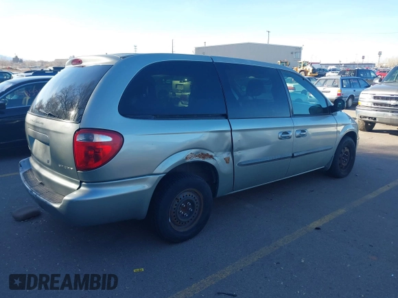 2003 Dodge Grand Caravan with VIN 2D8GP44383R156904, listed as a IAAI auction lot 41858820 with Not Provided miles and . Bid and sale history available at DreamBid. Image 4.