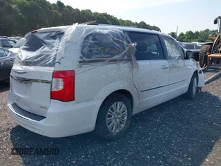 2015 Chrysler Town & Country Limited Platinum with VIN 2C4RC1GG2FR554713, listed as a IAAI auction lot 39868461 with 110,282 mi miles. Bid and sale history available at carsss.com. Image 4.