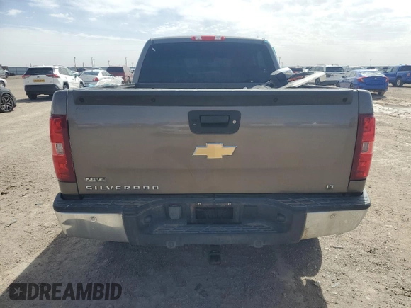 2011 Chevrolet Silverado 1500 LT with VIN 1GCRKSE33BZ332402, listed as a Copart auction lot 48675245 with 128,322 mi miles and Salvage Title. Bid and sale history available at DreamBid. Image 6.