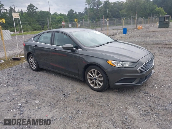 2017 Ford Fusion SE z VIN 3FA6P0HD6HR174945, wystawiony jako IAAI lot #42416548 z przebiegiem 128 410 mil mil oraz . Historia ofert i sprzedaży dostępna na DreamBid. Obrazek 1.
