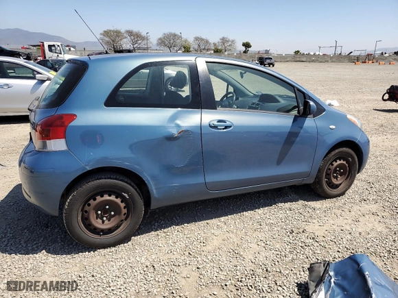 2009 Toyota Yaris with VIN JTDJT903995238147, listed as a Copart auction lot 52369925 with 124,921 mi miles and Salvage Title. Bid and sale history available at carsss.com. Image 3.