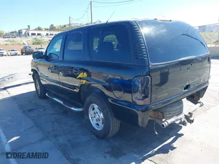 2001 Chevrolet Tahoe LT with VIN 1GNEC13T31R122882, listed as a IAAI auction lot 41999271 with 211,687 mi miles. Bid and sale history available at carsss.com. Image 3.