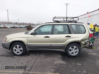 2003 Subaru Forester XS with VIN JF1SG65663H753306, listed as a IAAI auction lot 41311689 with 253,269 mi miles. Bid and sale history available at carsss.com. Image 14.