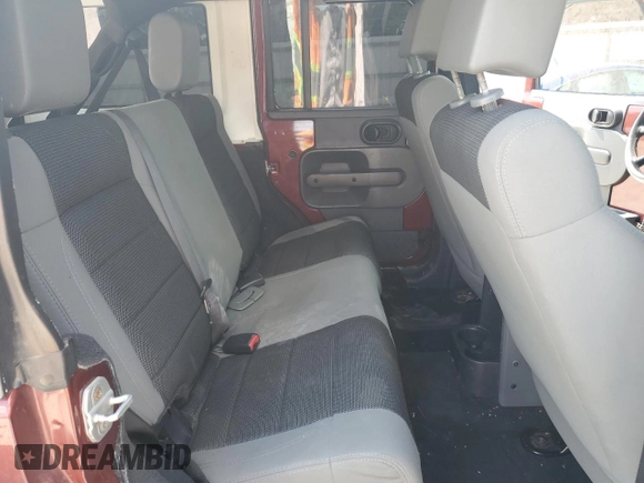 2007 Jeep Wrangler Unlimited X with VIN 1J4GA39187L161451, listed as a Copart auction lot 55280905 with 214,660 mi miles and Salvage Title. Bid and sale history available at DreamBid. Image 11.