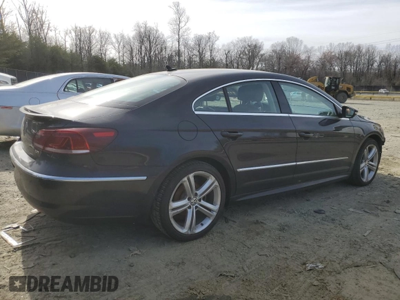 2015 Volkswagen CC Sport with VIN WVWBN7AN4FE814712, listed as a Copart auction lot 48027705 with 102,477 mi miles and Salvage Title. Bid and sale history available at DreamBid. Image 3.