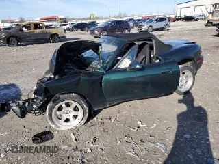 1999 Mazda MX-5 Miata z VIN JM1NB3536X0133733, wystawiony jako Copart lot #50906215 z przebiegiem Nie podano mil oraz Szkoda całkowita • Salvage title. Historia ofert i sprzedaży dostępna na DreamBid. Obrazek 1.