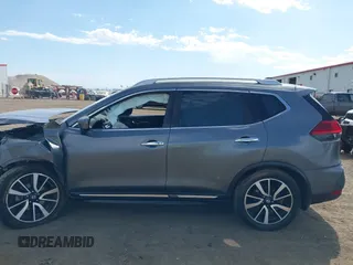 2017 Nissan Rogue SL z VIN JN8AT2MV9HW018040, wystawiony jako IAAI lot #42363401 z przebiegiem 76 020 mil mil oraz . Historia ofert i sprzedaży dostępna na DreamBid. Obrazek 14.