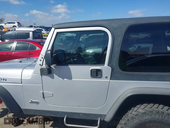 2004 Jeep Wrangler Rubicon with VIN 1J4FA69S94P701660, listed as a IAAI auction lot 41699554 with 74,640 mi miles. Bid and sale history available at carsss.com. Image 15.