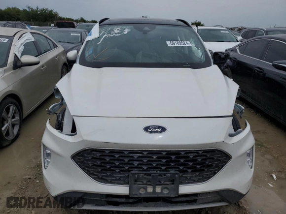 2022 Ford Escape Titanium z VIN 1FMCU9J91NUB93886, wystawiony jako Copart lot #69189524 z przebiegiem Nie podano mil oraz Czysty tytuł • Clean title. Historia ofert i sprzedaży dostępna na DreamBid. Obrazek 5.
