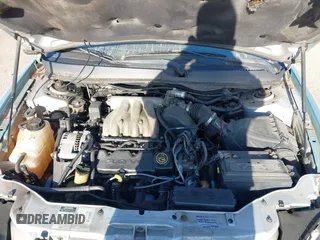 2000 Ford Taurus SE Standard z VIN 1FAFP582XYG181481, wystawiony jako IAAI lot #42033520 z przebiegiem 151 073 mil mil oraz . Historia ofert i sprzedaży dostępna na DreamBid. Obrazek 10.