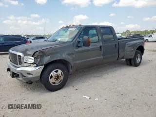2003 Ford F-350 XL z VIN 1FTWW32P63EC22991, wystawiony jako Copart lot #58196185 z przebiegiem 389 786 mil mil oraz Szkoda całkowita • Salvage title. Historia ofert i sprzedaży dostępna na DreamBid. Obrazek 1.