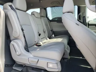 2023 Honda Odyssey Touring z VIN 5FNRL6H89PB052833, wystawiony jako Copart lot #53549185 z przebiegiem 49 471 mil mil oraz Szkoda całkowita • Salvage title. Historia ofert i sprzedaży dostępna na DreamBid. Obrazek 11.