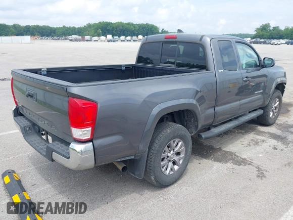 2017 Toyota Tacoma SR with VIN 5TFSX5EN9HX052395, listed as a IAAI auction lot 42290149 with 140,655 mi miles and . Bid and sale history available at DreamBid. Image 4.