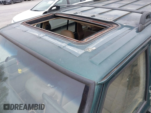 2001 Jeep Cherokee Sport with VIN 1J4FF48S51L561438, listed as a IAAI auction lot 41965207 with 222,868 mi miles and . Bid and sale history available at DreamBid. Image 12.
