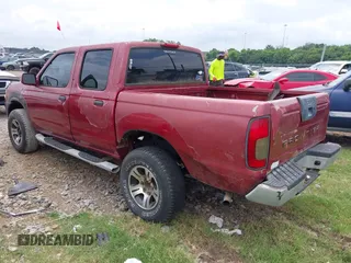 2001 Nissan Frontier SE with VIN 1N6ED27T61C302279, listed as a IAAI auction lot 42642272 with 137,066 mi miles and . Bid and sale history available at DreamBid. Image 3.