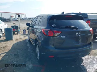 2016 Mazda CX-5 Touring with VIN JM3KE4CY3G0672977, listed as a IAAI auction lot 41889137 with 130,593 mi miles. Bid and sale history available at carsss.com. Image 3.