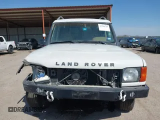2000 Land Rover Discovery Cloth z VIN SALTY124XYA262828, wystawiony jako IAAI lot #41769729 z przebiegiem 215 711 mil mil oraz . Historia ofert i sprzedaży dostępna na DreamBid. Obrazek 13.