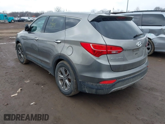 2016 Hyundai Santa Fe z VIN 5XYZTDLB1GG343763, wystawiony jako IAAI lot #41659641 z przebiegiem 96 415 mil mil oraz . Historia ofert i sprzedaży dostępna na DreamBid. Obrazek 3.