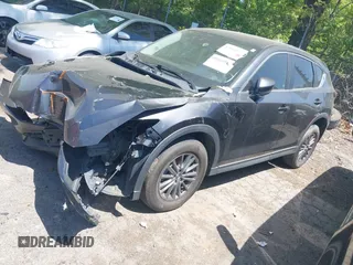 2017 Mazda CX-5 Touring with VIN JM3KFACL5H0197432, listed as a IAAI auction lot 42060117 with 1 mi miles. Bid and sale history available at carsss.com. Image 18.
