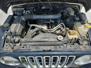 2001 Jeep Wrangler Sport с VIN 1J4FA49S91P347090, выставлен на аукционе Copart как лот 60436405 с пробегом 141 172 миль миль и Списание • Salvage title. История ставок и продаж доступна на DreamBid. Изображение 12.