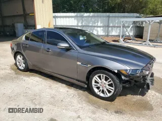 2017 Jaguar XE with VIN SAJAD4BNXHA975573, listed as a Copart auction lot 61804594 with 103,255 mi miles and Clean Title. Bid and sale history available at DreamBid. Image 4.
