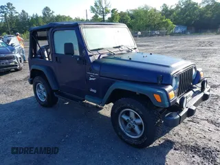 1998 Jeep Wrangler Sport z VIN 1J4FY19S8WP798559, wystawiony jako IAAI lot #42162734 z przebiegiem 129 638 mil mil oraz . Historia ofert i sprzedaży dostępna na DreamBid. Obrazek 1.