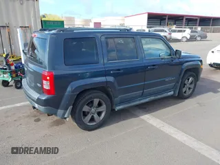 2014 Jeep Patriot Latitude with VIN 1C4NJPFA9ED679293, listed as a IAAI auction lot 42078681 with 94,124 mi miles and . Bid and sale history available at DreamBid. Image 4.