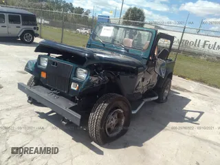 1995 Jeep Wrangler S with VIN 1J4FY19P4SP207049, listed as a IAAI auction lot 41315322 with 12,454 mi miles. Bid and sale history available at carsss.com. Image 2.