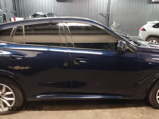 2022 BMW X6 M50i z VIN 5UXCY8C05N9J70601, wystawiony jako IAAI lot #42344397 z przebiegiem 49 085 mil mil oraz . Historia ofert i sprzedaży dostępna na DreamBid. Obrazek 13.