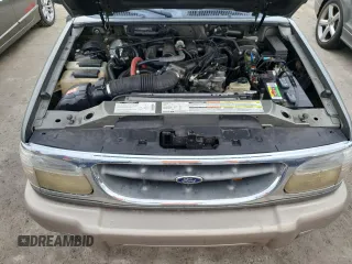 1999 Ford Explorer XL z VIN 1FMDU32E9XZB67958, wystawiony jako Copart lot #75350694 z przebiegiem 202 939 mil mil oraz Szkoda całkowita • Salvage title. Historia ofert i sprzedaży dostępna na DreamBid. Obrazek 12.