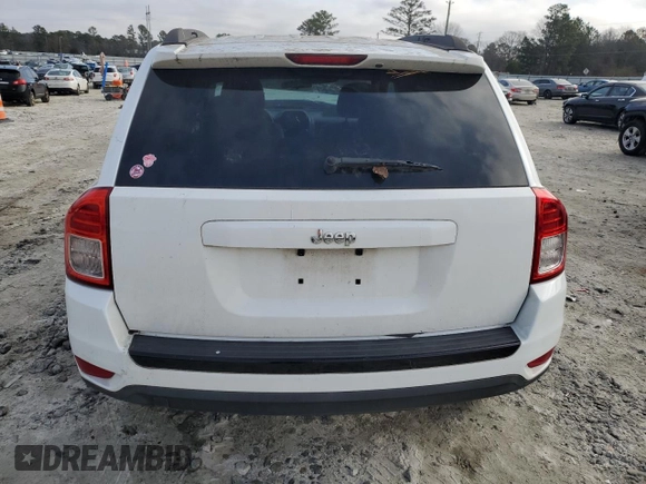2012 Jeep Compass Latitude with VIN 1C4NJCEA3CD706818, listed as a Copart auction lot 42098135 with 138,859 mi miles and Salvage Title. Bid and sale history available at carsss.com. Image 6.