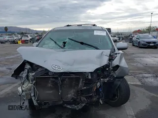 2012 Toyota Sienna XLE with VIN 5TDDK3DC9CS042847, listed as a IAAI auction lot 40970090 with 101,813 mi miles. Bid and sale history available at carsss.com. Image 13.