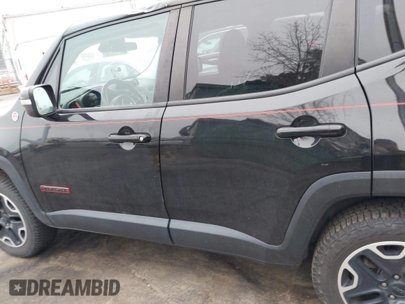 2015 Jeep Renegade Trailhawk with VIN ZACCJBCT0FPC45038, listed as a IAAI auction lot 41796152 with 91,456 mi miles and . Bid and sale history available at DreamBid. Image 14.