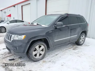 2011 Jeep Grand Cherokee 70th Anniversary with VIN 1J4RR4GG4BC519507, listed as a IAAI auction lot 41537091 with 175,967 mi miles. Bid and sale history available at carsss.com. Image 2.