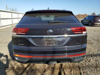 2023 Volkswagen Atlas SE with VIN 1V2KE2CA2PC206051, listed as a Copart auction lot 77347584 with 19,297 mi miles and Salvage title. Bid and sale history available at DreamBid. Image 6.