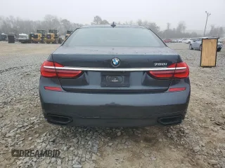 2019 BMW 7 Series 750i with VIN WBA7F0C54KGM25281, listed as a Copart auction lot 84741334 with 76,472 mi miles and Salvage Title. Bid and sale history available at carsss.com. Image 6.