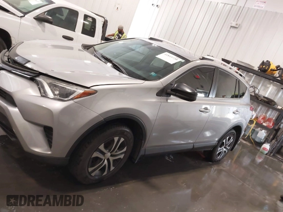 2016 Toyota RAV4 LE with VIN 2T3BFREV7GW450556, listed as a IAAI auction lot 41815720 with 106,734 mi miles. Bid and sale history available at carsss.com. Image 15.