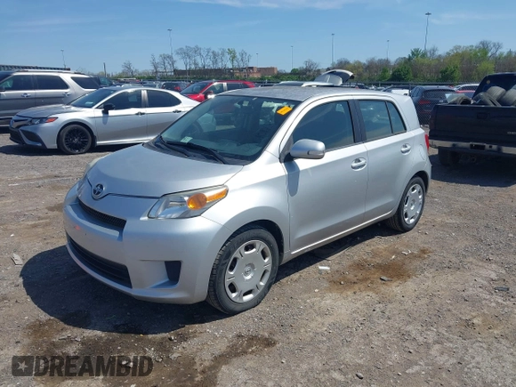 2008 Scion xD with VIN JTKKU10498J016301, listed as a IAAI auction lot 42010128 with 175,225 mi miles. Bid and sale history available at carsss.com. Image 2.
