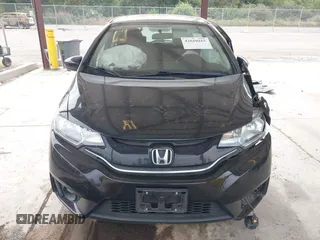 2015 Honda Fit EX-L z VIN 3HGGK5H81FM701122, wystawiony jako IAAI lot #42610165 z przebiegiem 74 969 mil mil oraz . Historia ofert i sprzedaży dostępna na DreamBid. Obrazek 13.