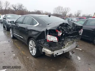2014 Chevrolet Impala LTZ with VIN 1G1155S34EU164127, listed as a IAAI auction lot 41697650 with 1 mi miles. Bid and sale history available at carsss.com. Image 3.
