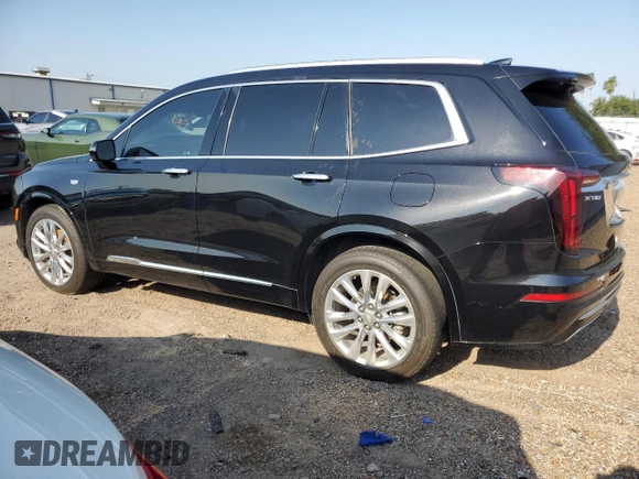 2020 Cadillac XT6 FWD Premium Luxury с VIN 1GYKPCRSXLZ174002, выставлен на аукционе Copart как лот 52083235 с пробегом 79 712 миль миль и Списание • Salvage title. История ставок и продаж доступна на DreamBid. Изображение 2.