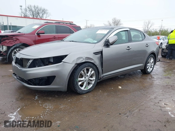 2013 Kia Optima EX z VIN 5XXGN4A72DG166687, wystawiony jako IAAI lot #41967631 z przebiegiem 202 712 mil mil oraz . Historia ofert i sprzedaży dostępna na DreamBid. Obrazek 18.