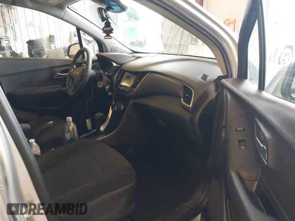 2020 Chevrolet Trax LS with VIN 3GNCJNSB0LL145009, listed as a IAAI auction lot 42551051 with 142,013 mi miles and . Bid and sale history available at DreamBid. Image 5.