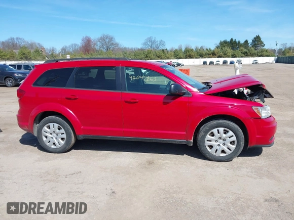 2016 Dodge Journey SE with VIN 3C4PDCAB2GT165839, listed as a IAAI auction lot 42045161 with 147,007 mi miles and . Bid and sale history available at DreamBid. Image 13.