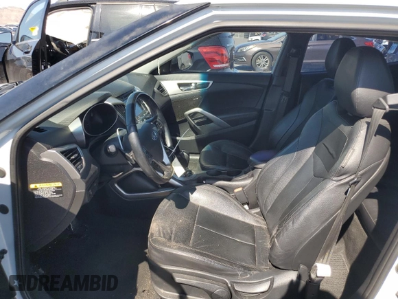 2015 Hyundai Veloster z VIN KMHTC6ADXFU222793, wystawiony jako Copart lot #57861415 z przebiegiem 98 318 mil mil oraz Szkoda całkowita • Salvage title. Historia ofert i sprzedaży dostępna na DreamBid. Obrazek 7.